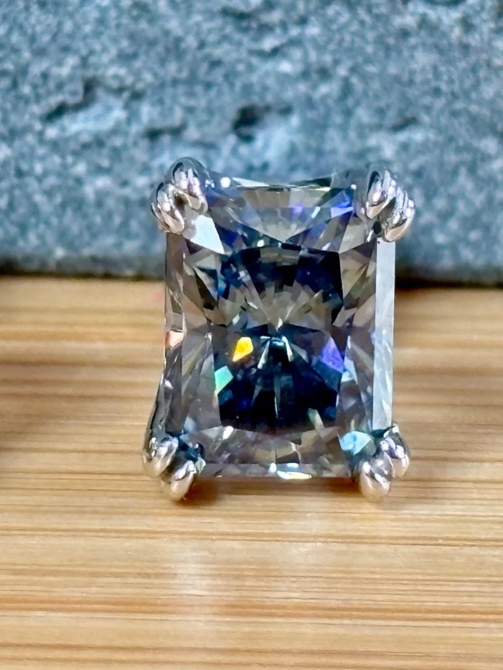 6ctw gray radiant Moissanite studs in sterling mountings with double claws!